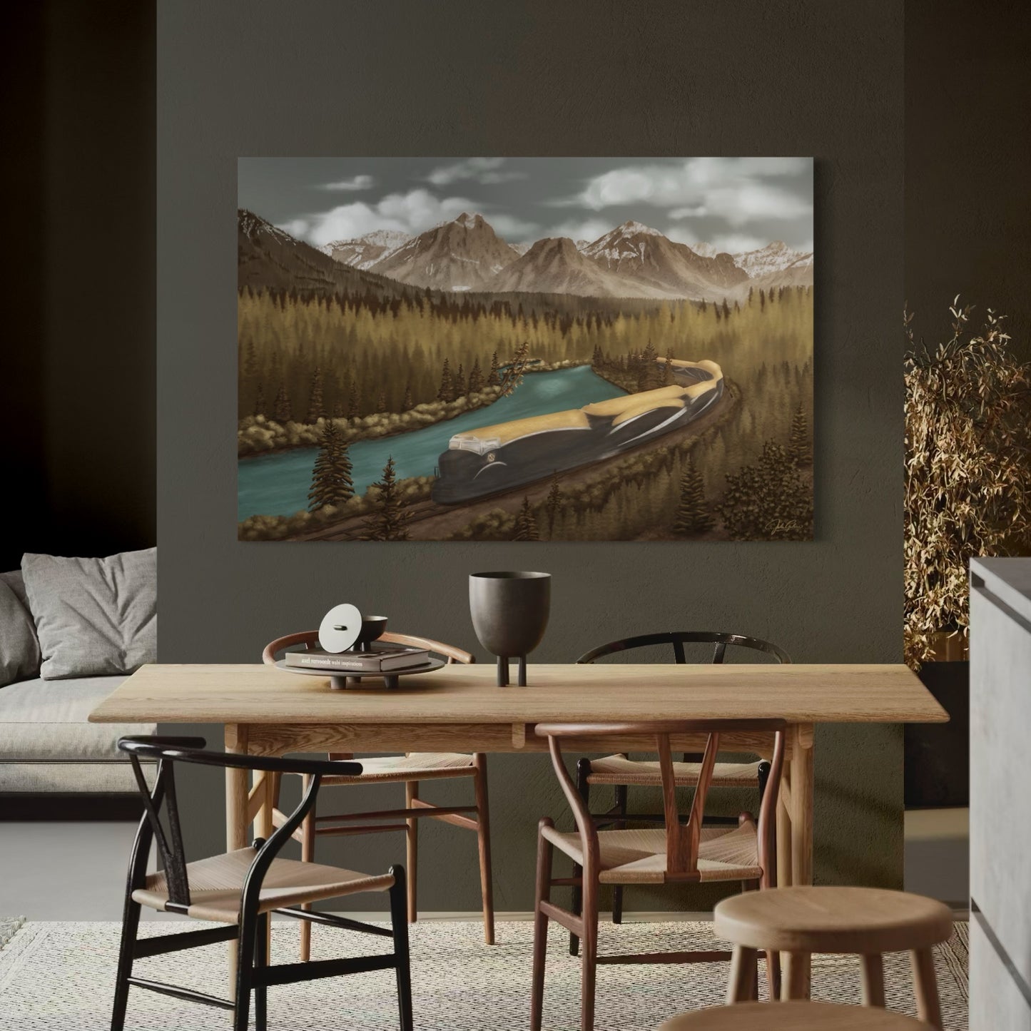 Dining room with a large wall art of a mountain landscape above a wooden table.