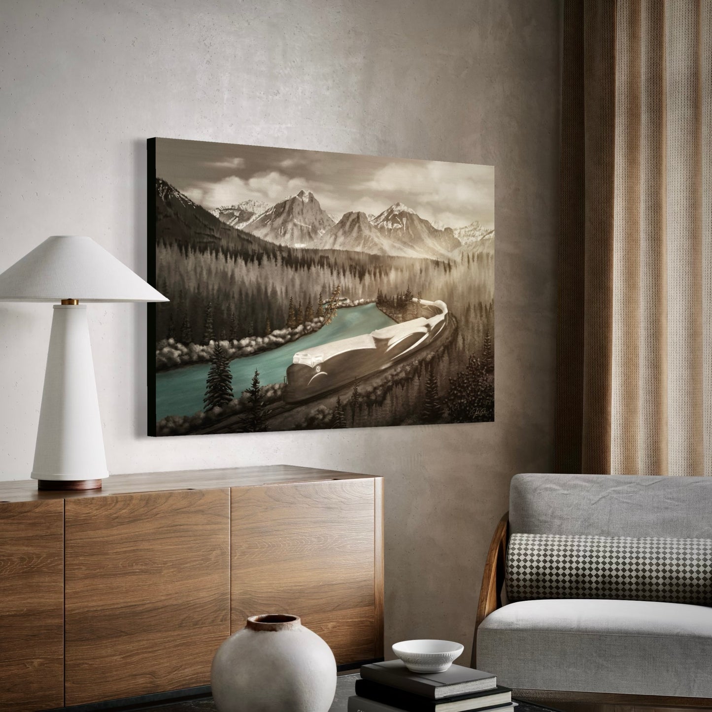 Living room with a mountain landscape painting on the wall, wooden sideboard, and gray sofa.