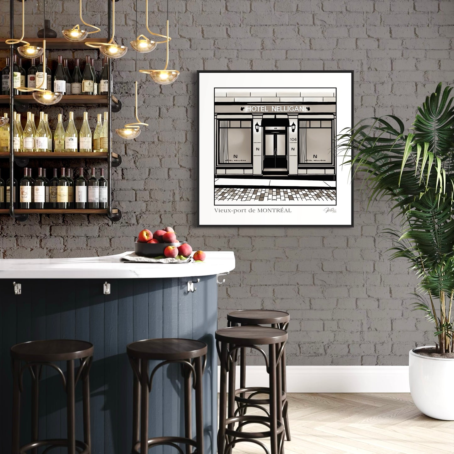 Bar area with a framed black and white print on a gray brick wall, surrounded by bottles and decor.