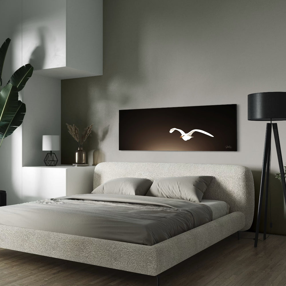 Modern bedroom with a bed, plants, and hand drawn white bird flying wall art in a minimalistic setting.